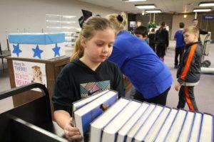 Girl Selecting a Book